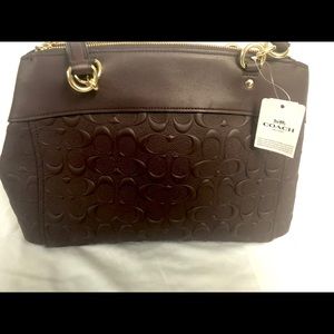 New Coach purse with straps and tags